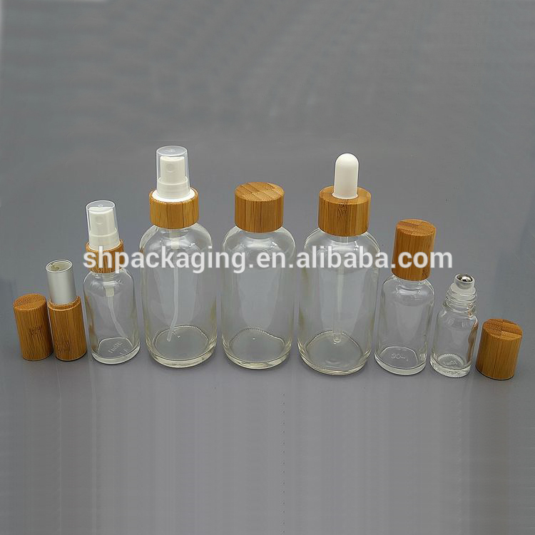 clear glass bottles with bamboo cap 24/410 bamboo dropper 1oz 4oz spray bottle and 10ml 30ml roll on bottles