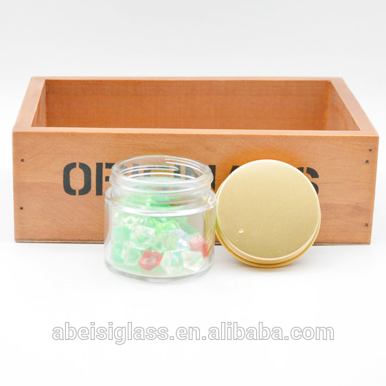 clear straight side cosmetic glass face cream jar with gold metal lid
