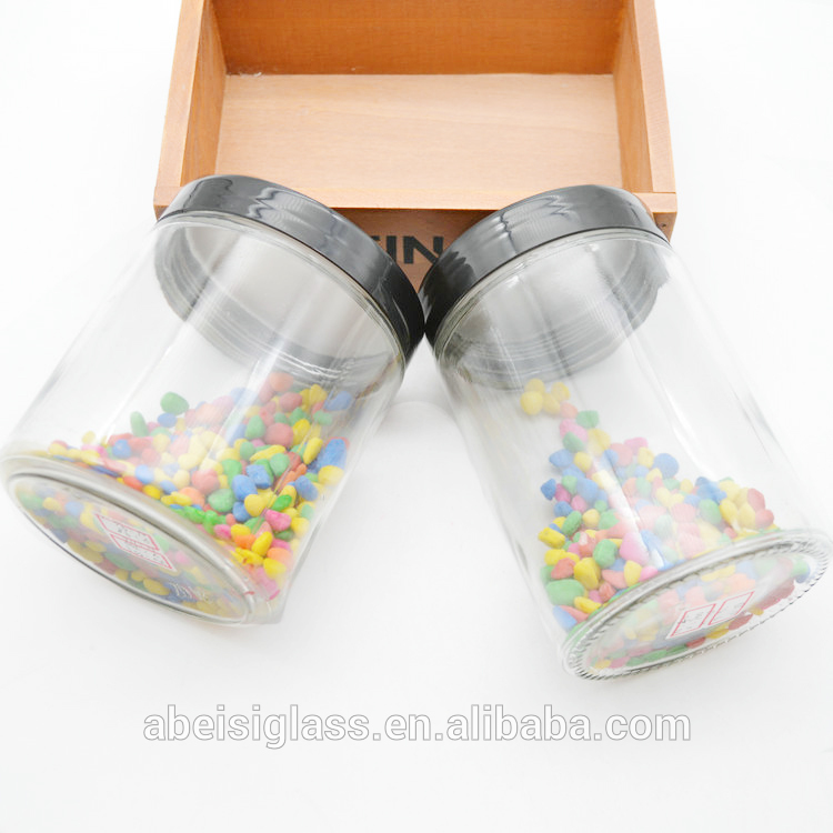 clear straight side glass jar with black lid