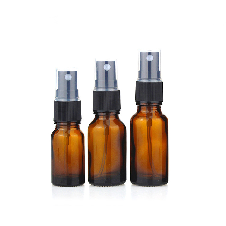 cosmetic packaging amber glass spray bottles  glass bottle with black spray lid