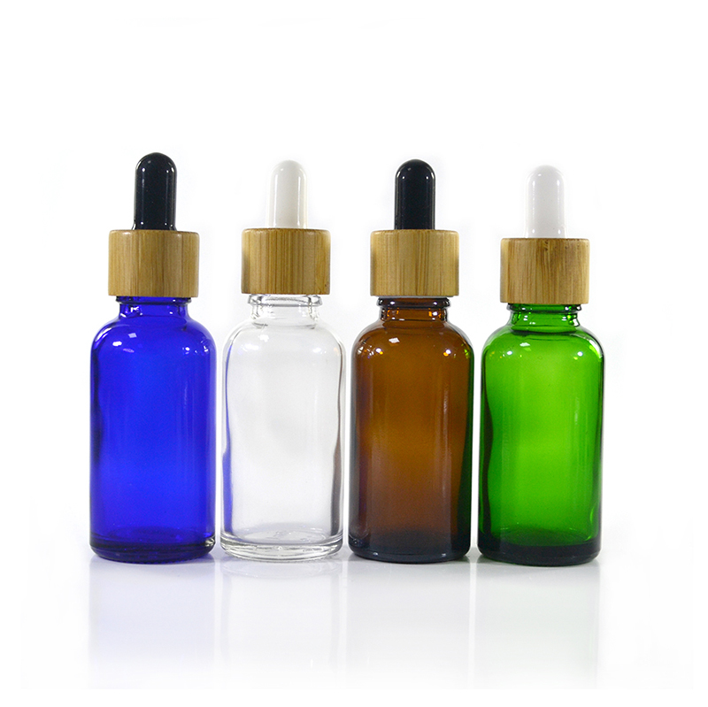 cosmetic packaging container 30ml 1oz 50ml 100ml bamboo cap glass dropper bottle for essential oil