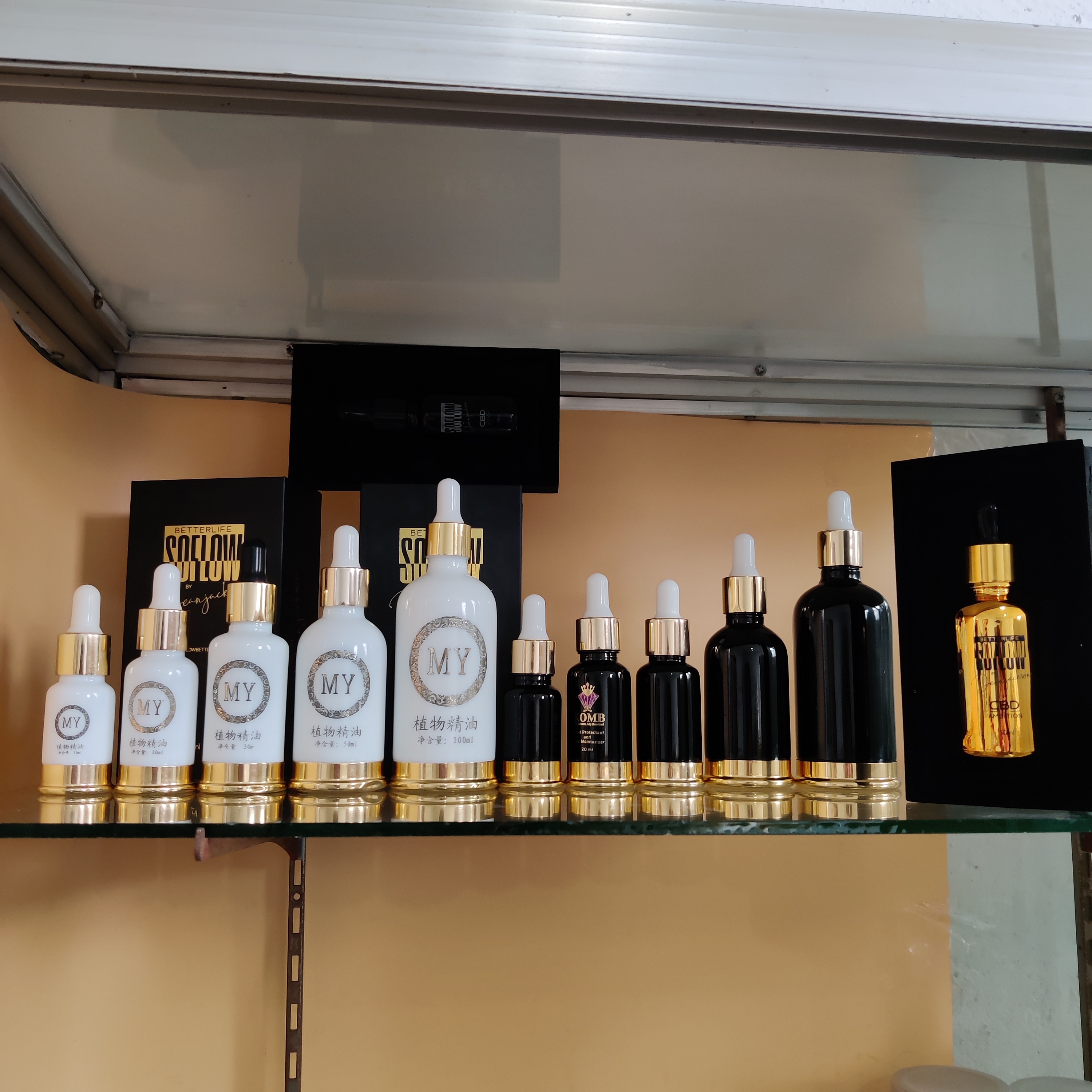 cosmetic packaging gold base metal opal white essential oil glass bottle with dropper bottle screen printing serum bottle