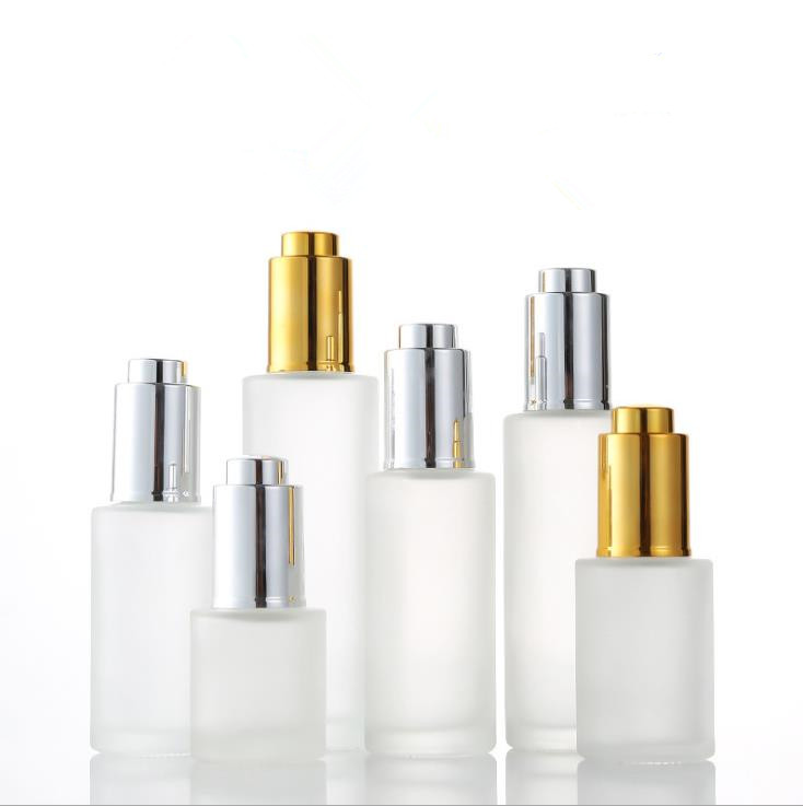 cosmetics packaging empty 30ml 1oz flat shoulder glass pump dropper bottle with silver/gold pump