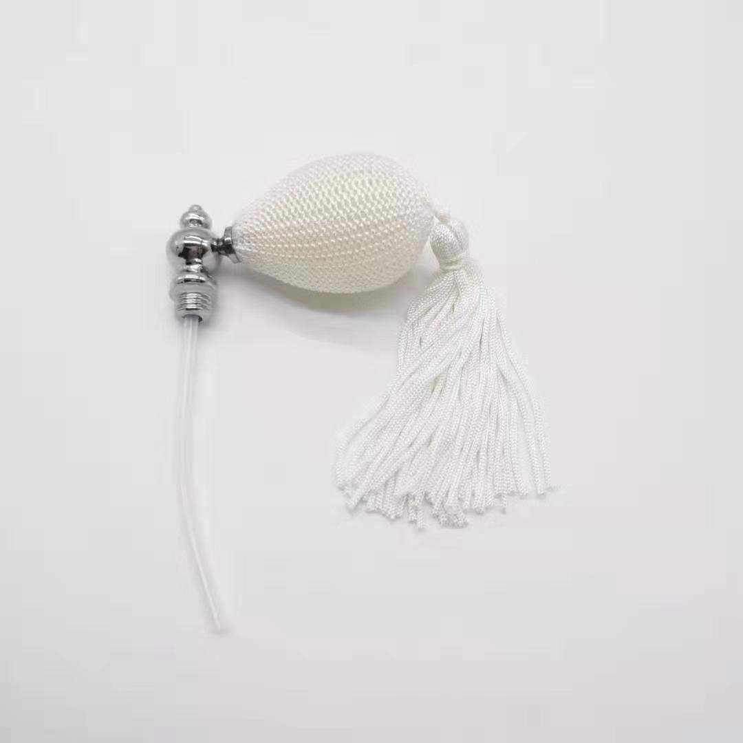 cream coloured perfume bulb atomizer