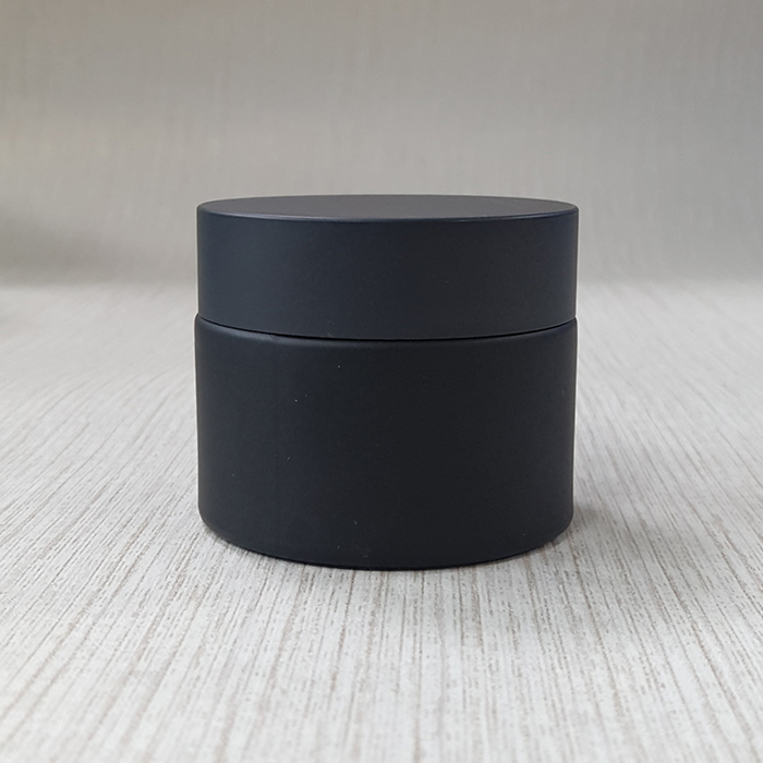 cream packing black frosted glass jar with matte black plastic cap