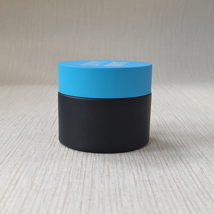 cream packing black frosted glass jar with matte black plastic cap