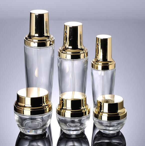 custom cosmetic bottle with silver /gold spray /lotion pump cap
