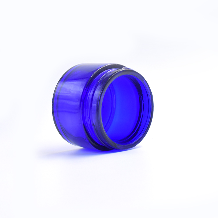 custom cosmetics packaging 50ml 50g cobalt blue glass jars with uv red lid