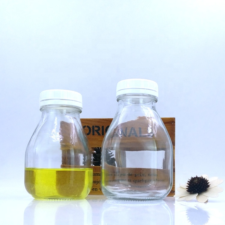 custom design 12oz 16oz cold brew coffee packaging 470ml 500ml empty milk tea glass bottle for cold pressed juice drinks labels