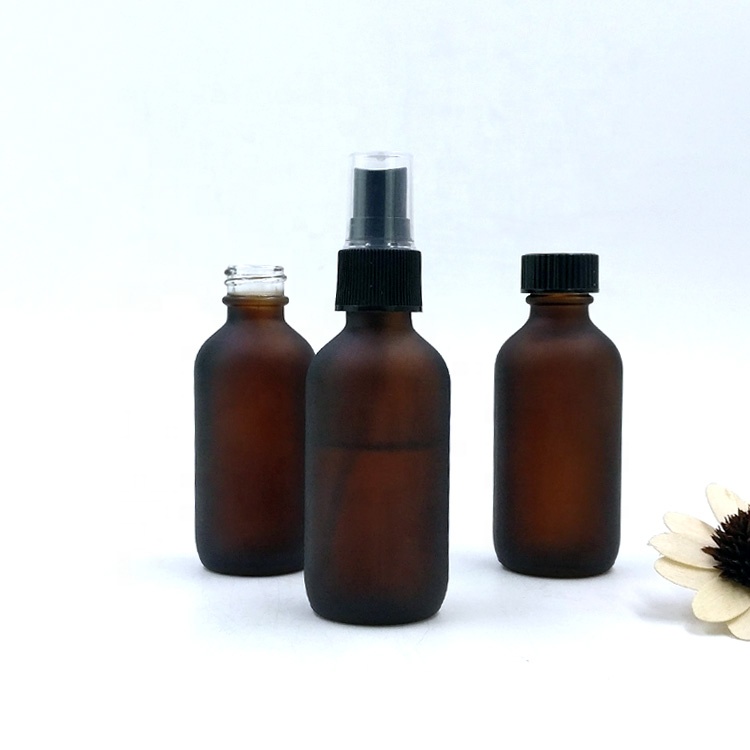 custom design 60ml empty matte amber boston round packaging 2oz frosted brown glass spray bottle with pump sprayer
