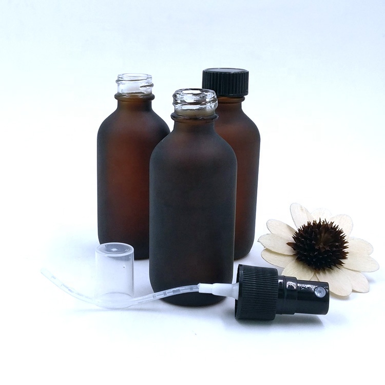 custom design 60ml empty matte amber boston round packaging 2oz frosted brown glass spray bottle with pump sprayer