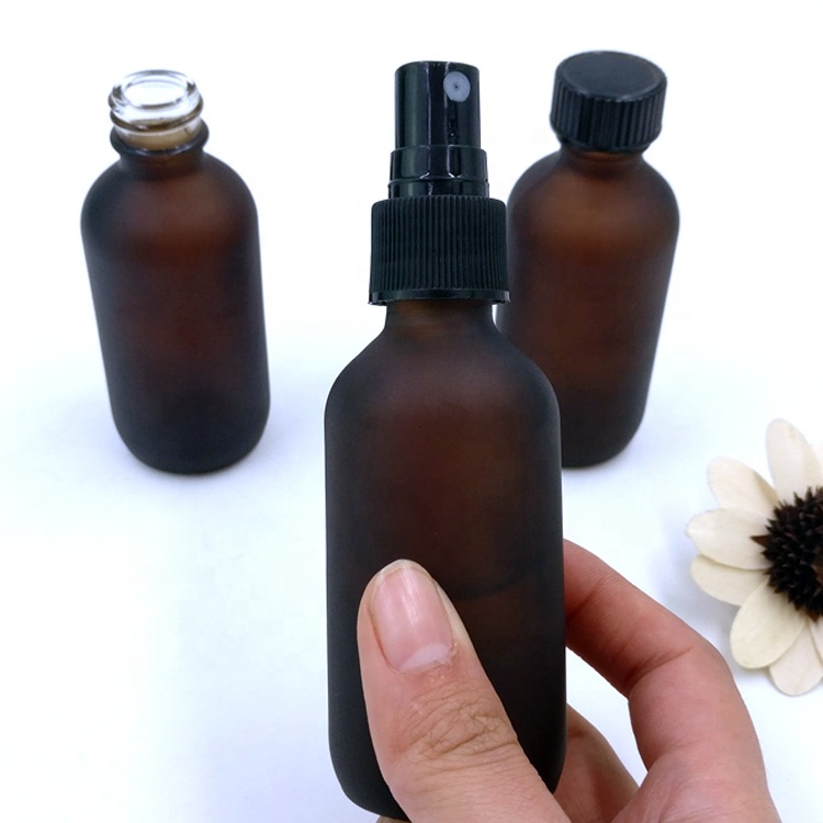 custom design 60ml empty matte amber boston round packaging 2oz frosted brown glass spray bottle with pump sprayer