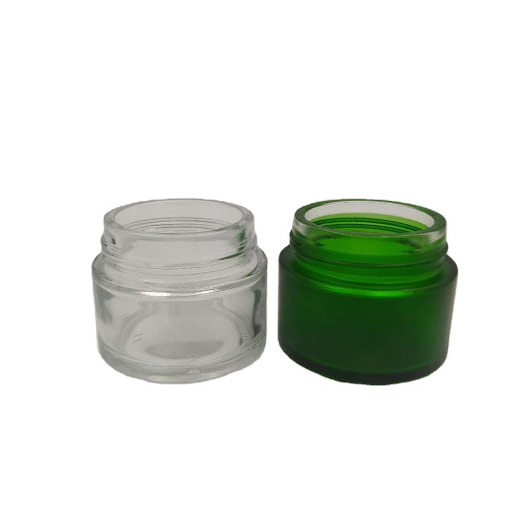 custom design free sample 100g green frosted glass cosmetic jars for cream