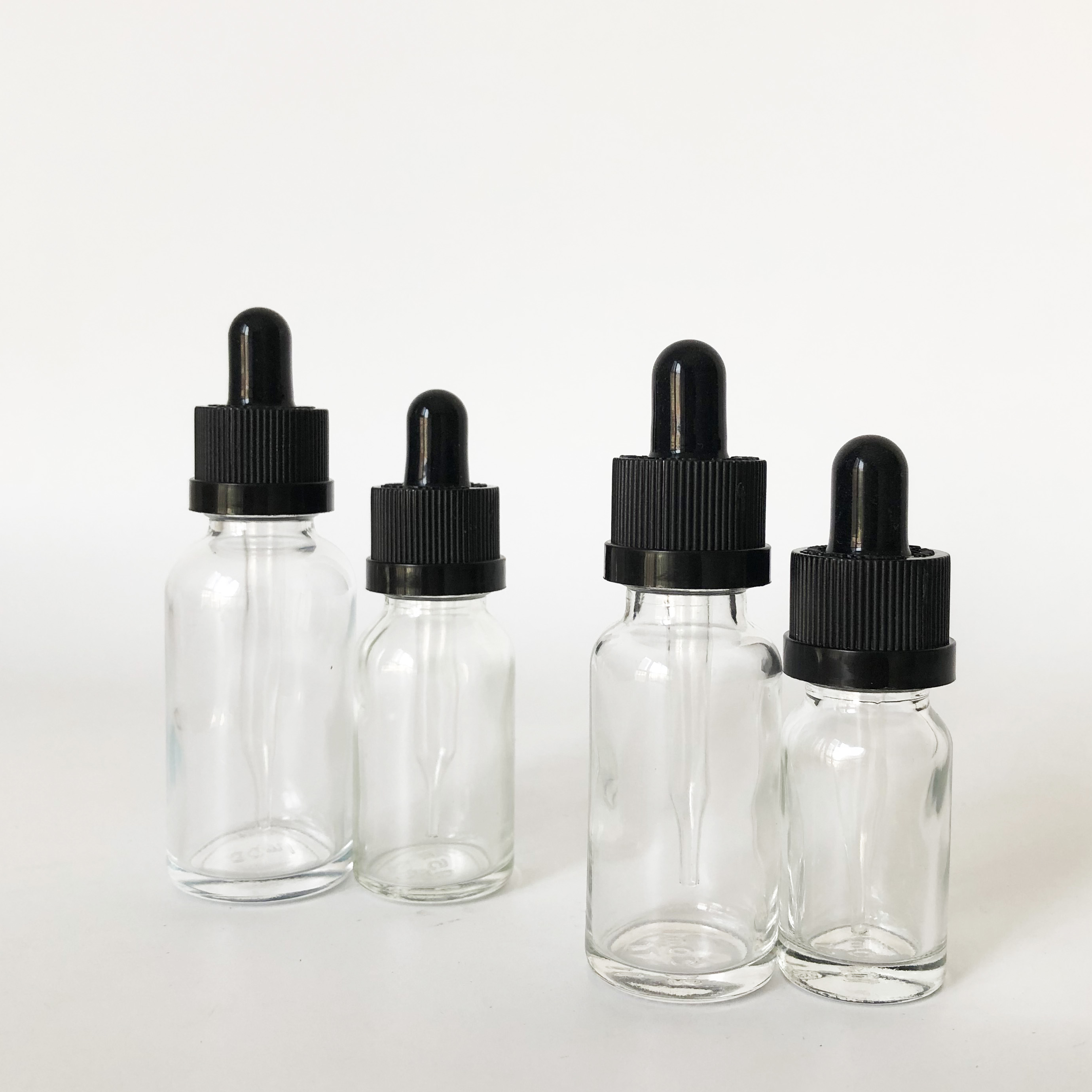 custom glass roller bottle 10ml 15ml 20ml 30ml clear glass dropper bottle for essential oil with childproof cap