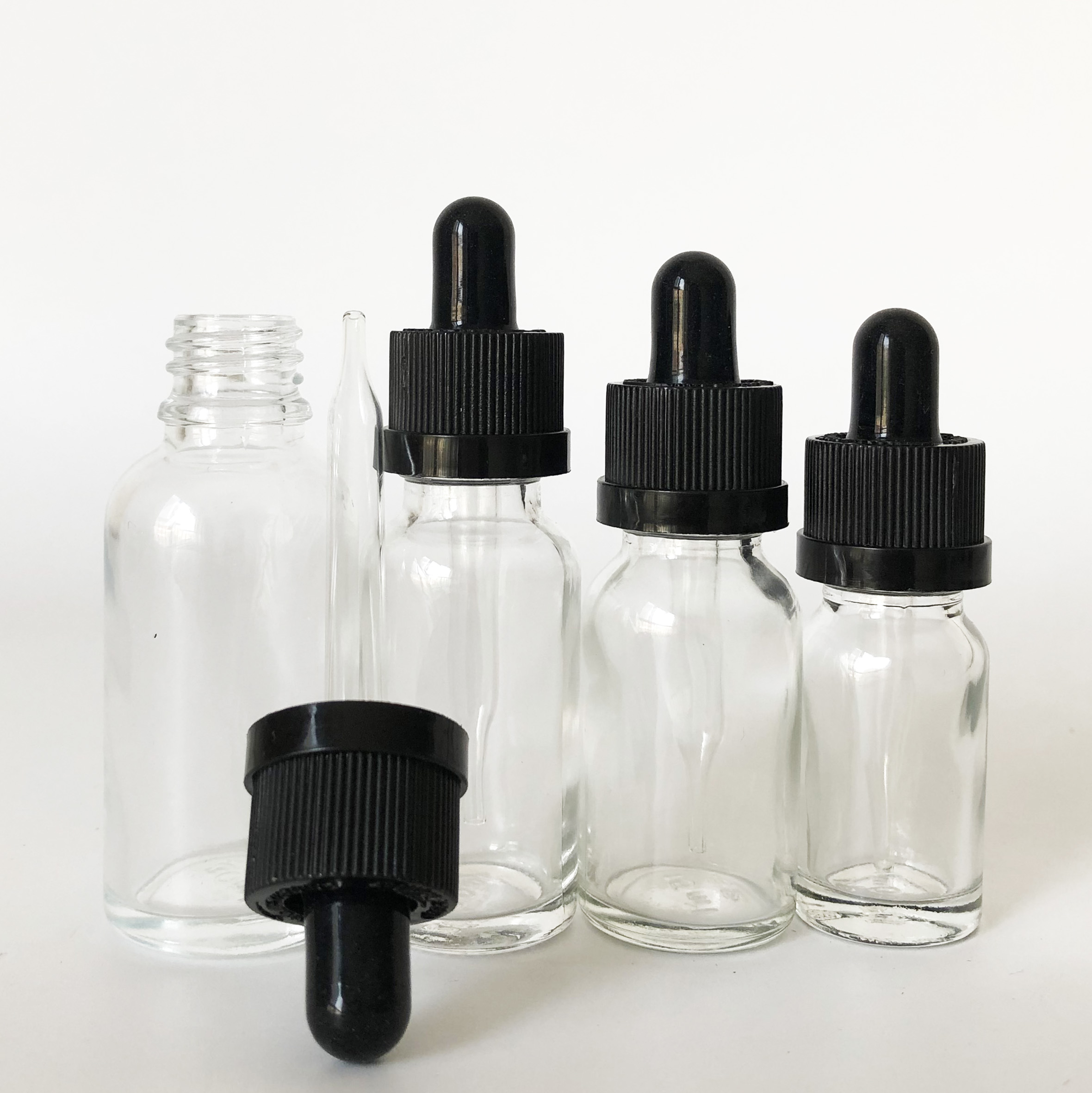 custom glass roller bottle 10ml 15ml 20ml 30ml clear glass dropper bottle for essential oil with childproof cap