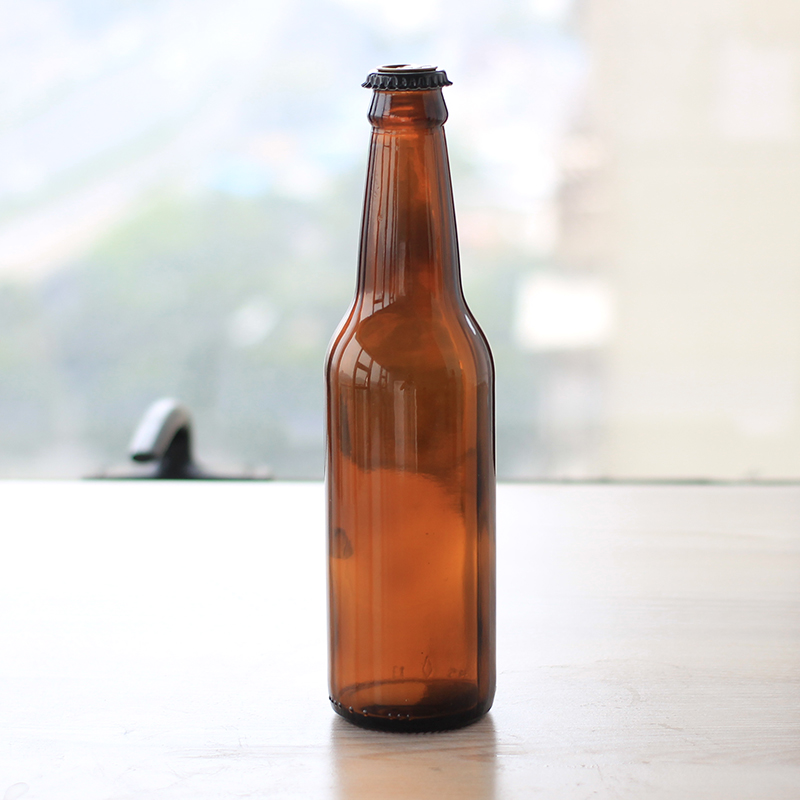 custom logo amber or clear 330ml beer glass bottles with metal cap