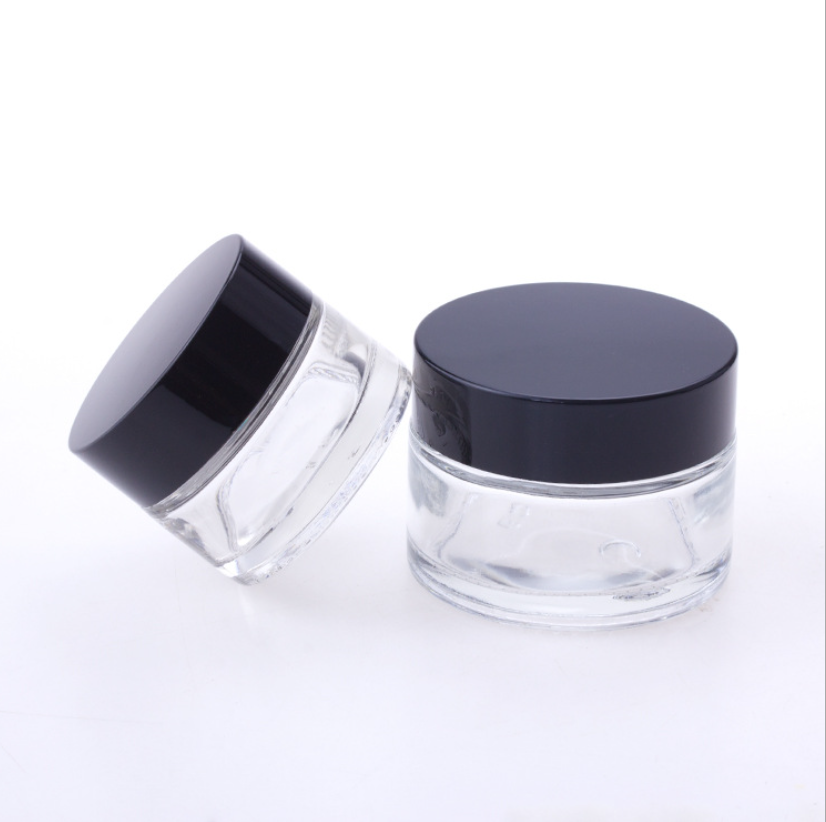 custom logo size wholesale empty clear glass cosmetic jars 5g 10g 15g 30g 50g 100g glass cream jars with plastic cap