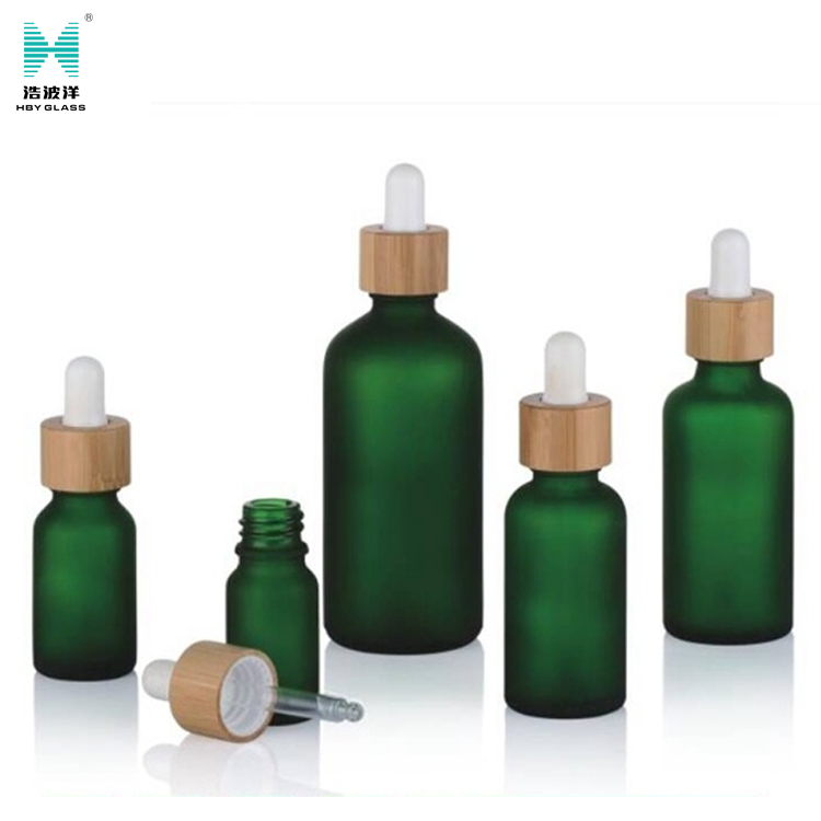 custom logo wooden cap green blue amber bottle for essential oil with dropper