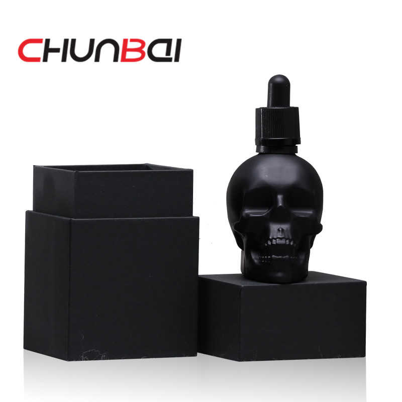 custom made clear skull 30ml glass dropper bottles with paper box for smoking oil