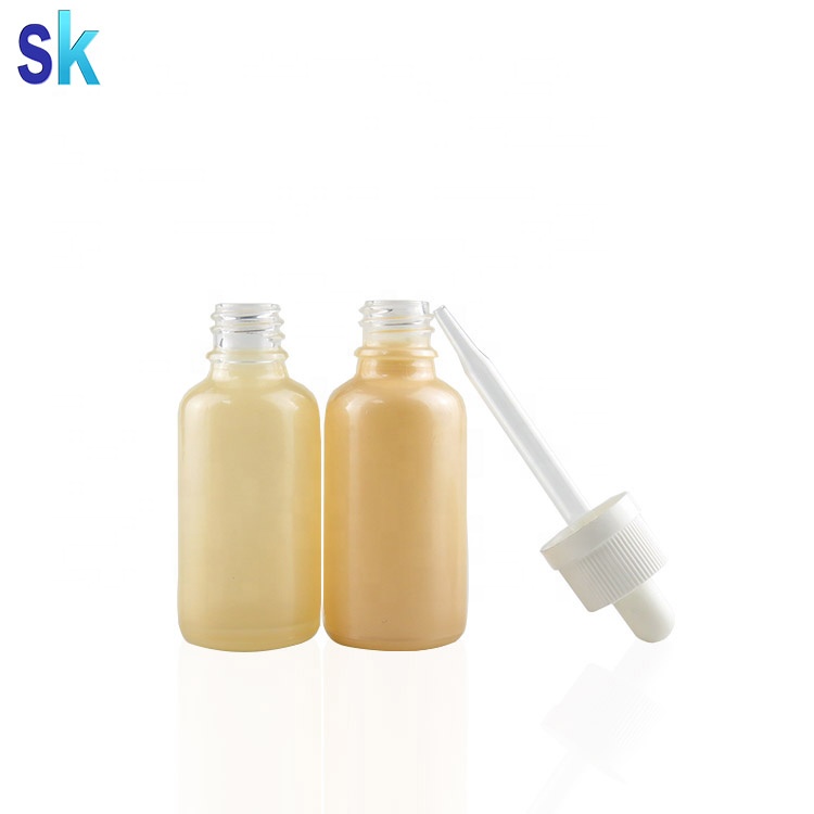 custom printed coloured 1oz pink glass liquid bottle with glass dropper