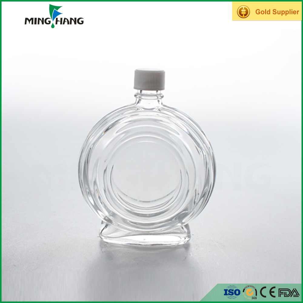 customized 180 ml blue ice decanter bulk empty mini flat round shape glass clear wine bottle