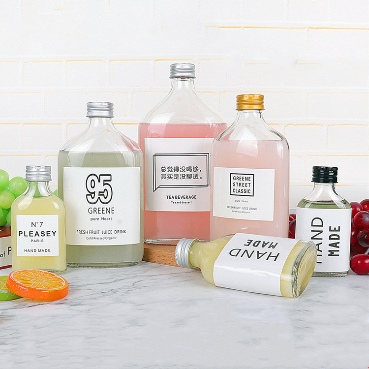 customized 50ml 100ml 200ml 250ml 350ml 500ml flat glass beverage bottle for cold brew with screw cap