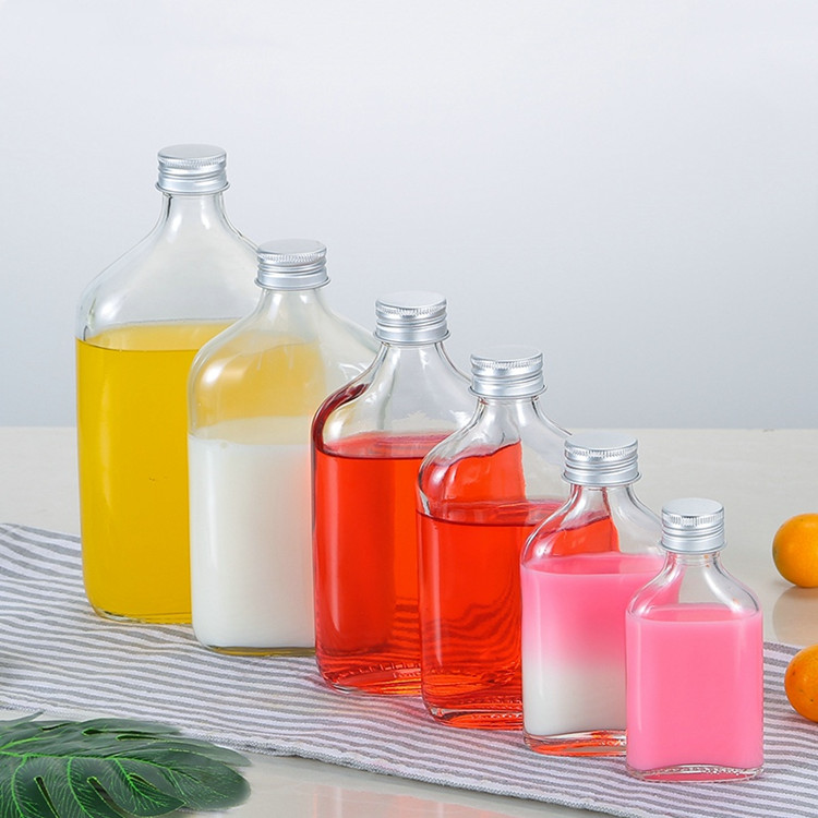 customized 50ml 100ml 200ml 250ml 350ml 500ml flat glass beverage bottle for cold brew with screw cap