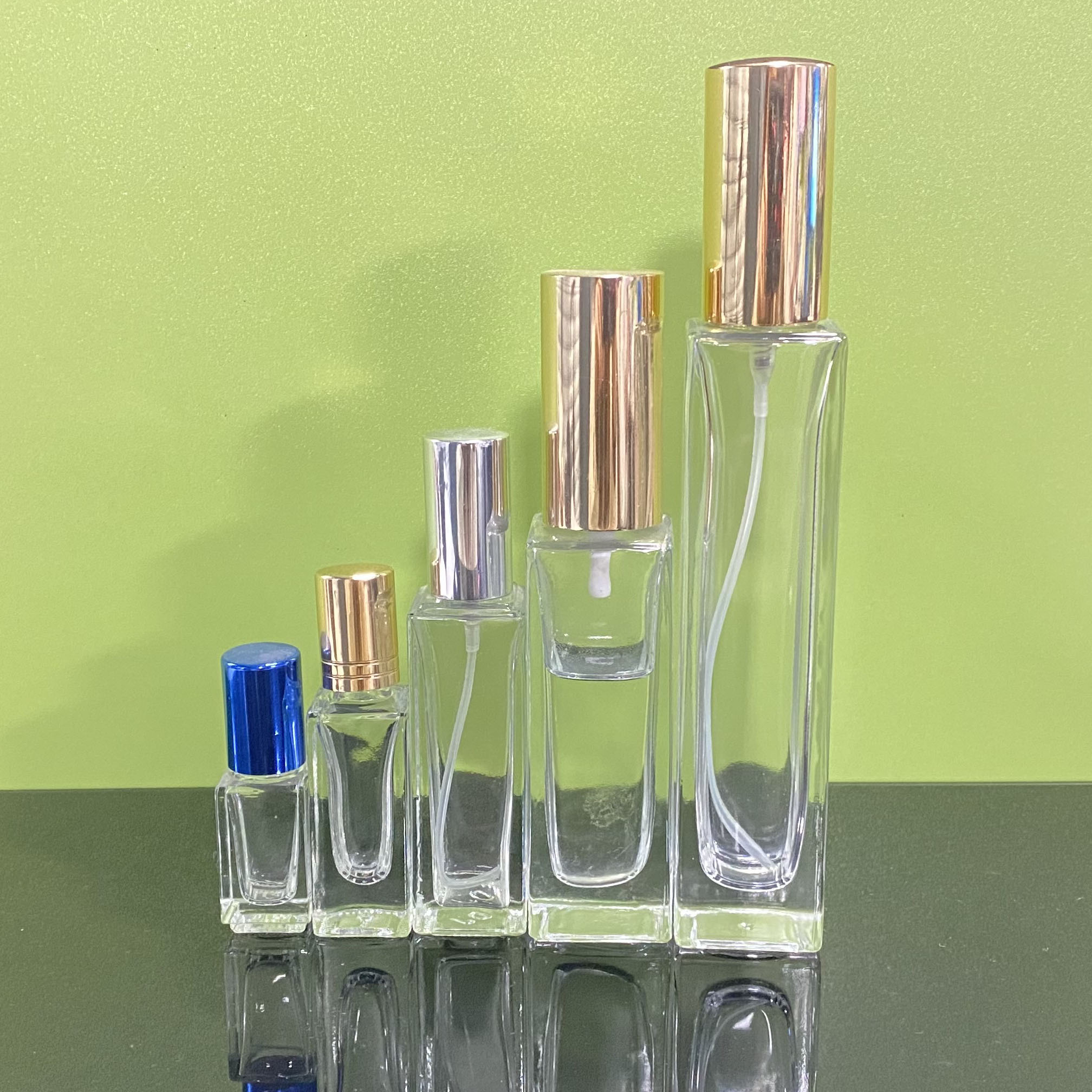 eco friendly cylinder square rectangle clear glass perfume sprayer and roll-on bottle with metal lid