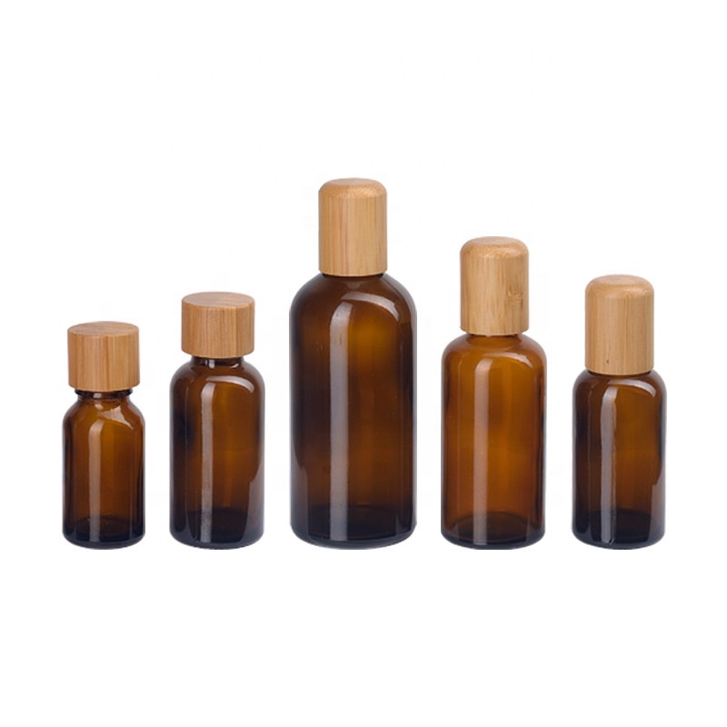 empty amber glass essential oil bottle 5ml 10ml 15ml 20ml 30ml 50ml 100ml with 18mm bamboo wood screw cap and reducer for oil