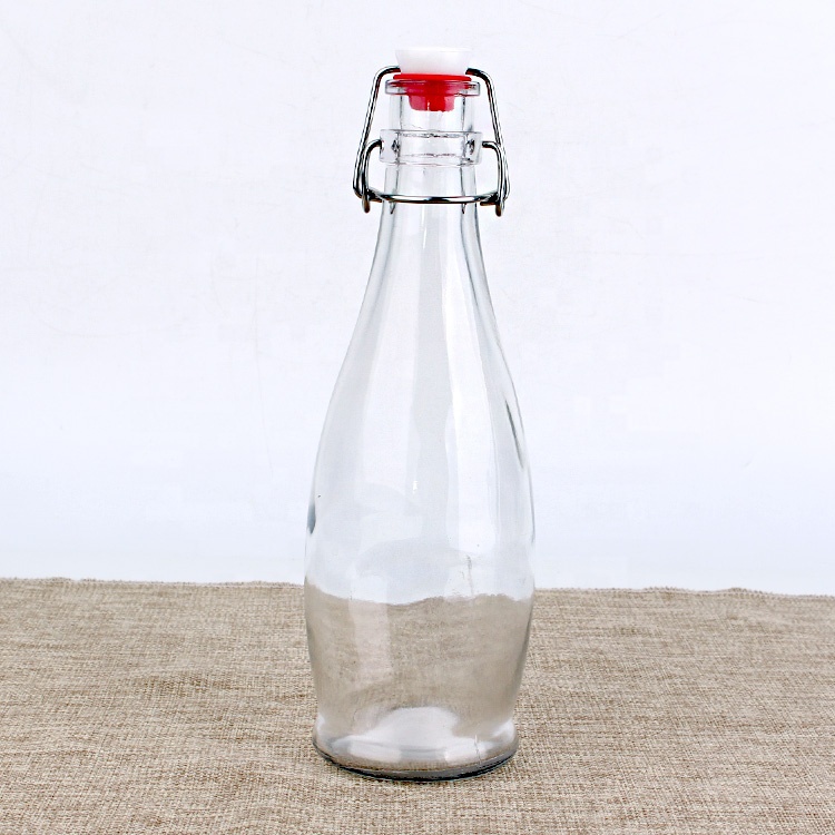 empty clear 350ml swing top glass dressing bottles with flip cap