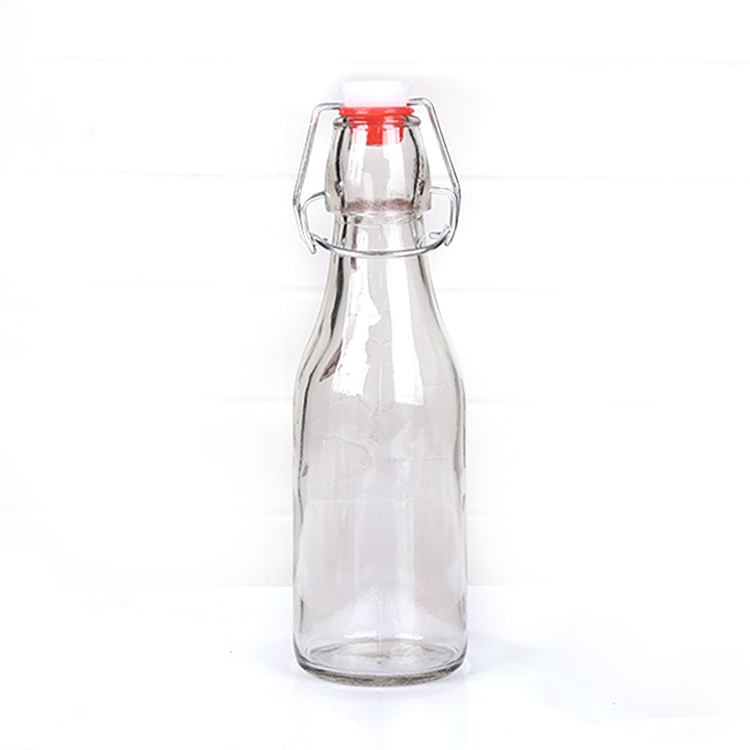 empty clear glass oil bottle with airtight swing top lid 750ml