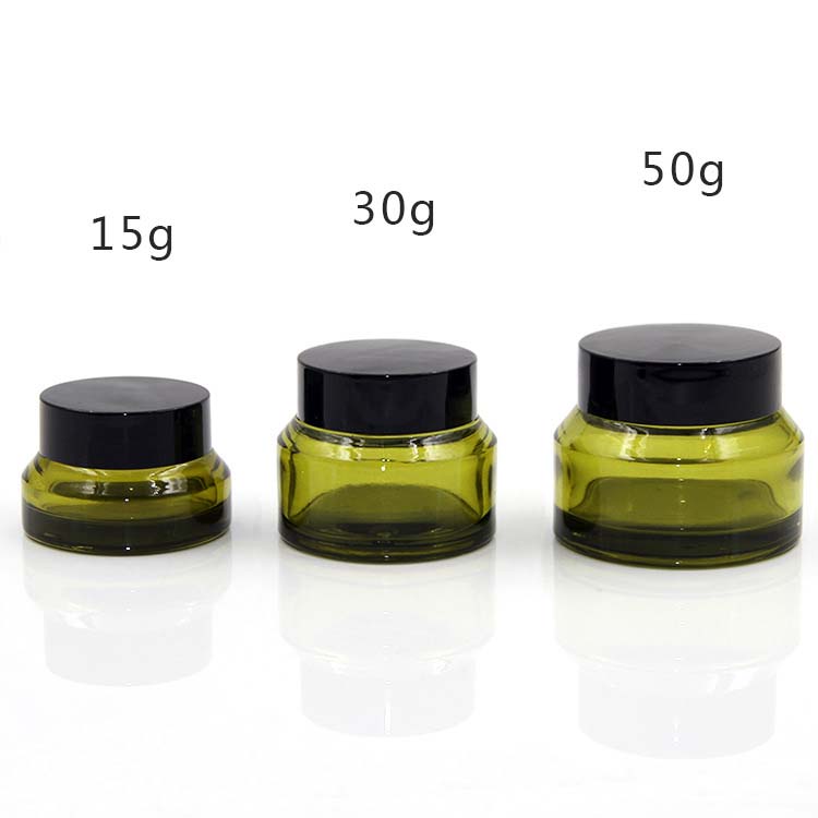 empty cosmetics cream ember glass jar with black crew cup