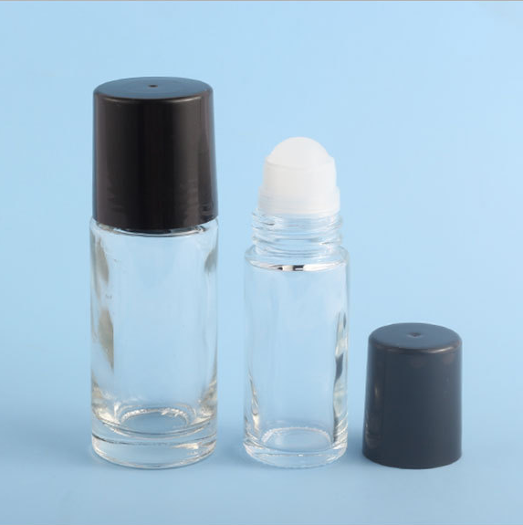 empty eco friendly 15ml 30ml 50ml round clear glass roll on cosmetic deodorant bottle container packaging black cap