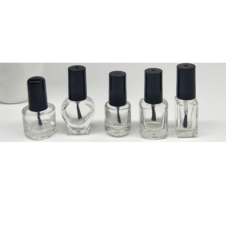 empty glass luxury nail polish bottle with brush cap
