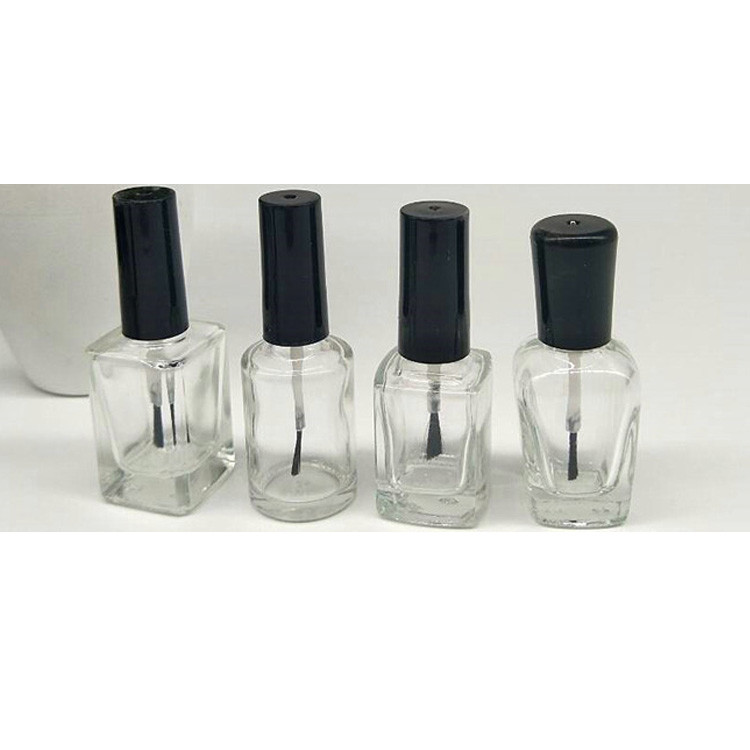 empty glass luxury nail polish bottle with brush cap
