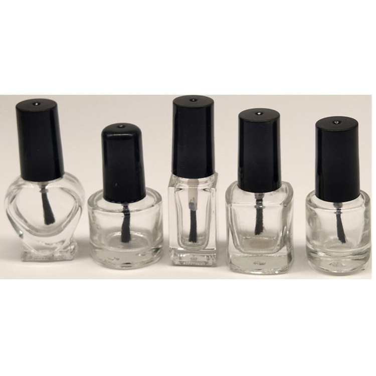 empty glass luxury nail polish bottle with brush cap