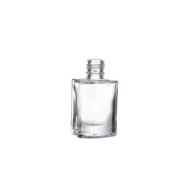 empty nail polish bottle with brush