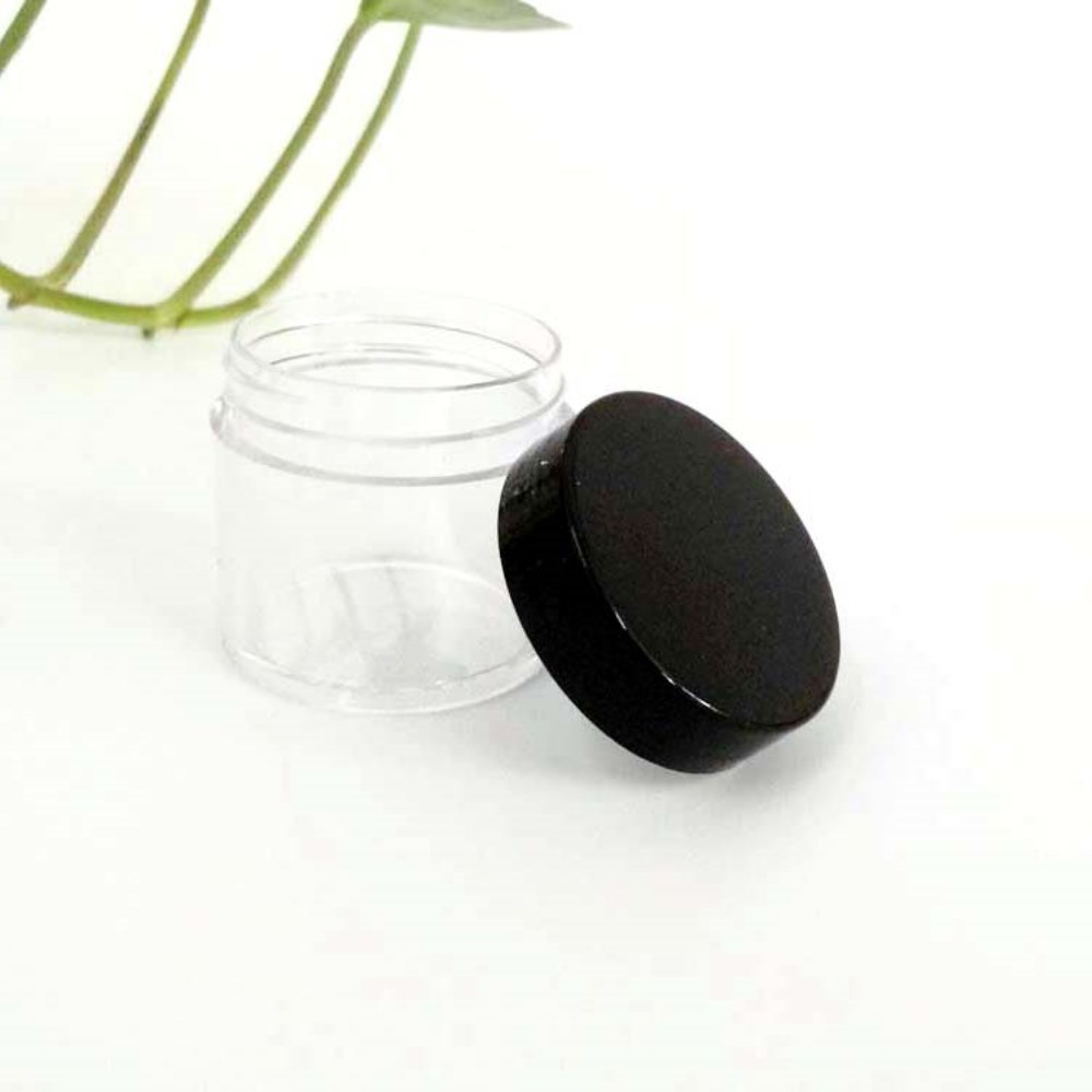 empty plastic 30g jar with black lid