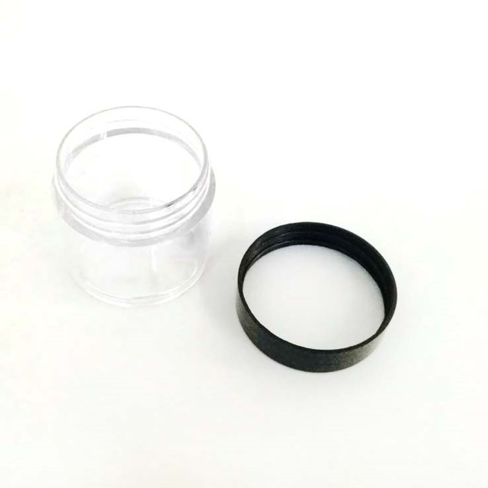 empty plastic 30g jar with black lid