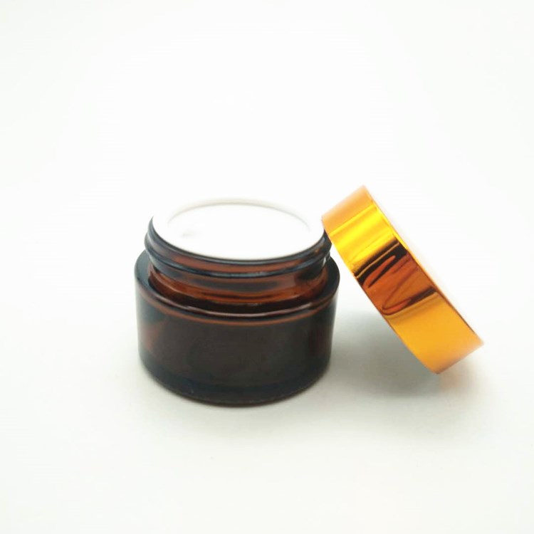 empty round shape amber glass jar for face cream packaging