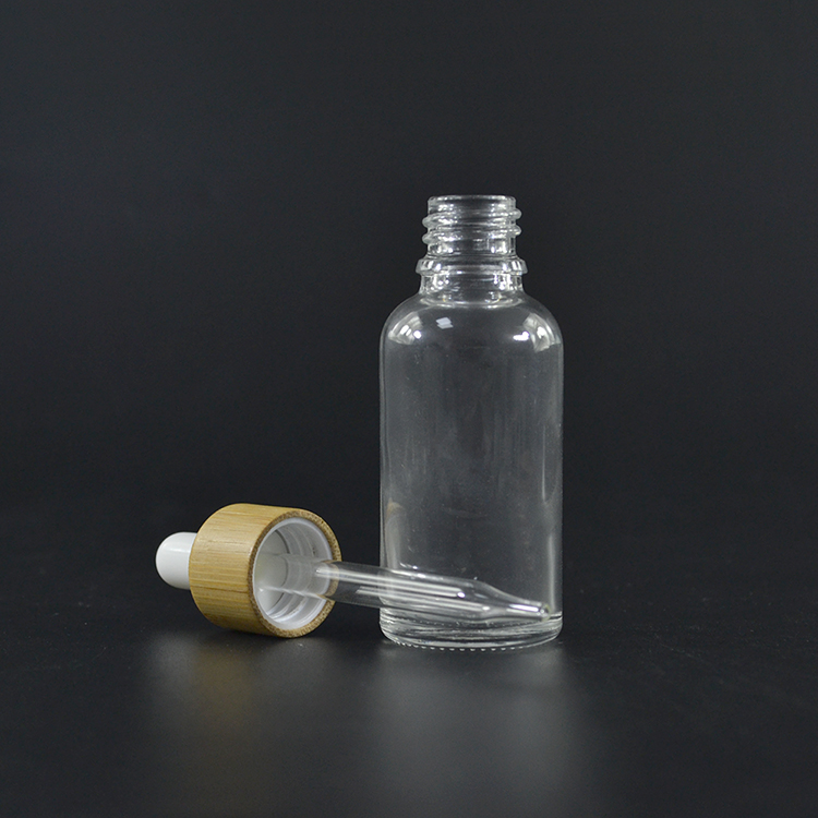essential oil 15ml 30ml 50ml 100ml clear blue amber green glass dropper bottle with bamboo cap