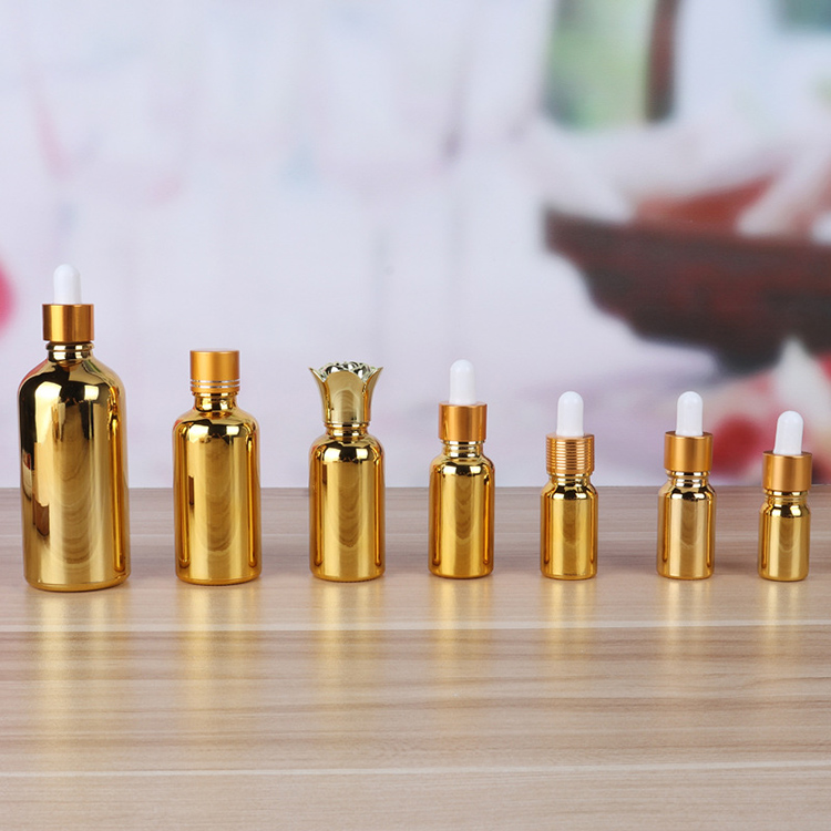 essential oil gold glass dropper bottle with pump cap