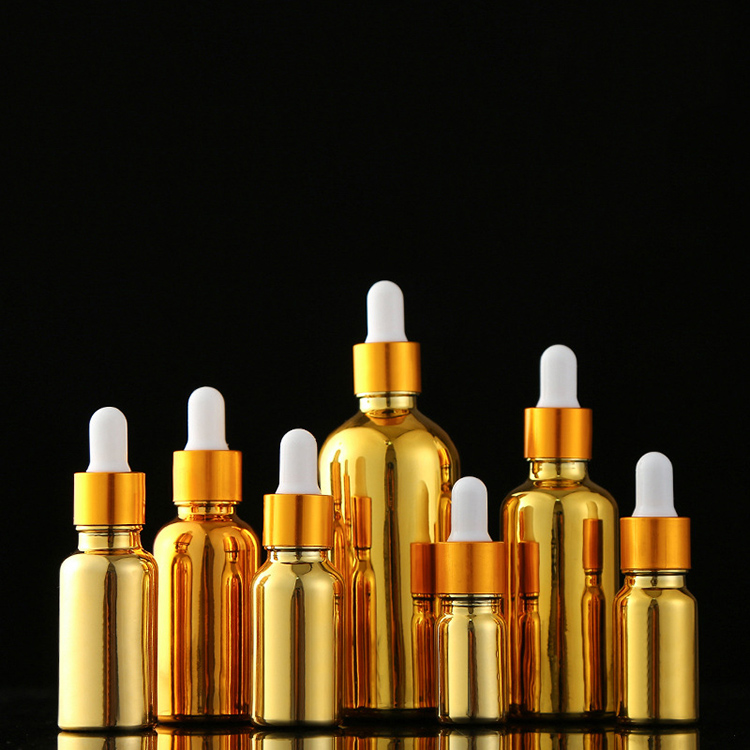 essential oil gold glass dropper bottle with pump cap