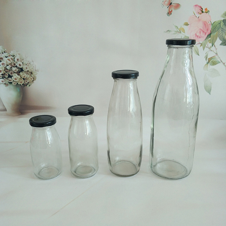 factory direct sale customizable BPA free metal cap 200ml 250ml 500ml 1000ml Glass milk bottle with lids