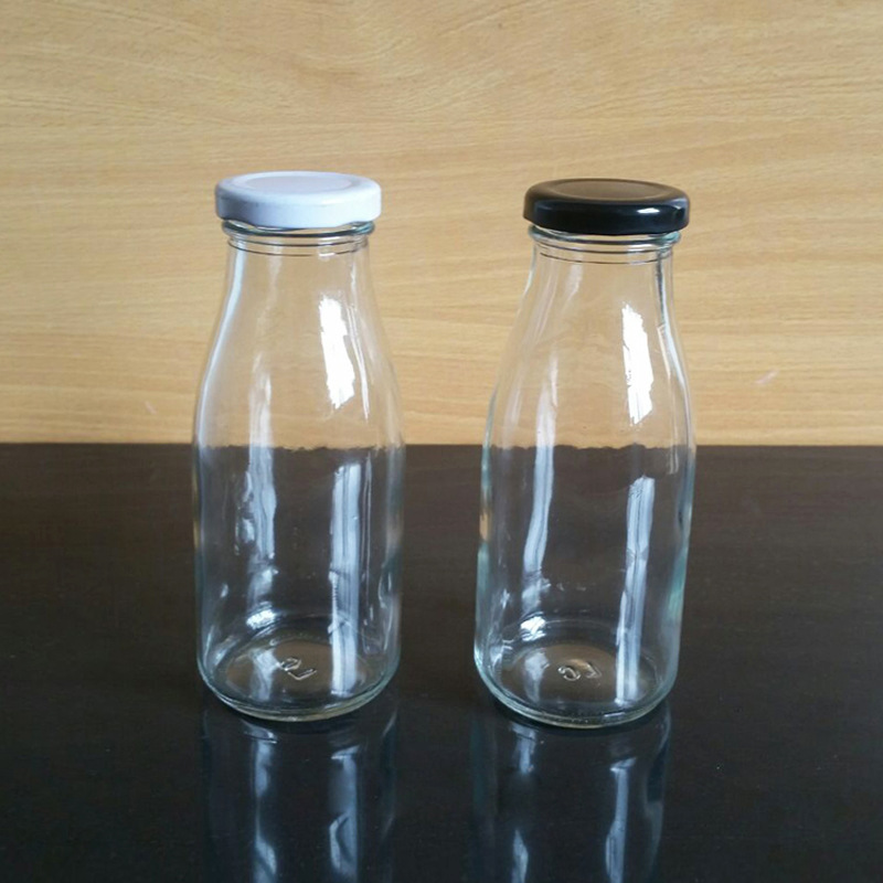 factory direct sale customizable BPA free metal cap 200ml 250ml 500ml 1000ml Glass milk bottle with lids