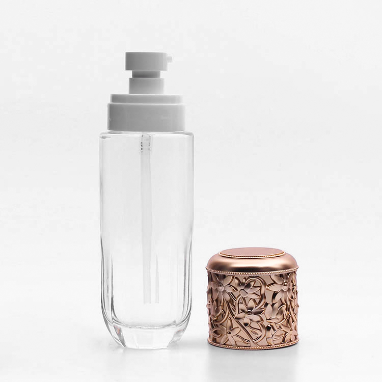 fancy clear empty glass bottle jar with plastic golden emboss lid cosmetic glass jar with screw top lid makeup set bottles