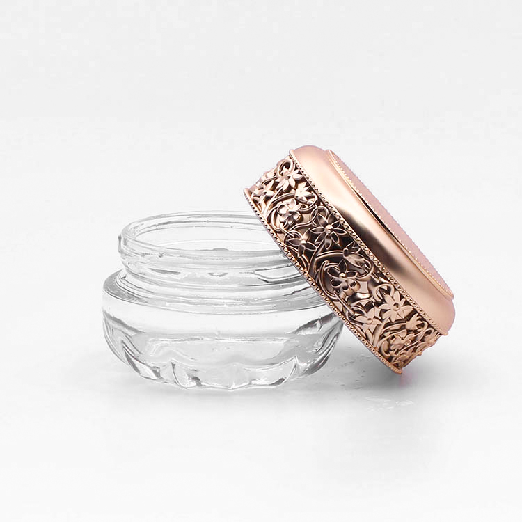 fancy clear empty glass bottle jar with plastic golden emboss lid cosmetic glass jar with screw top lid makeup set bottles