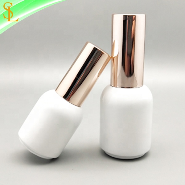 fancy custom round glossy white empty uv gel nail polish bottles 10ml 15ml with rose gold round caps and flat gel brush