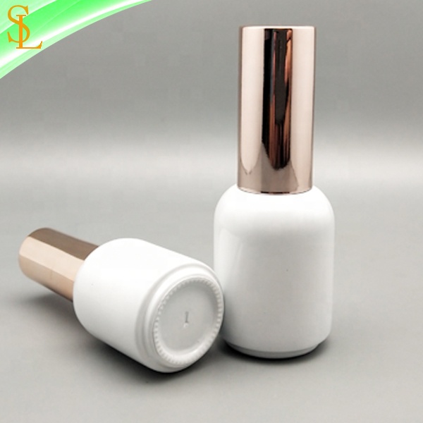 fancy custom round glossy white empty uv gel nail polish bottles 10ml 15ml with rose gold round caps and flat gel brush