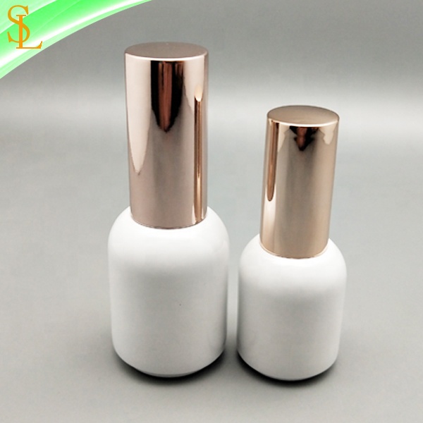 fancy custom round glossy white empty uv gel nail polish bottles 10ml 15ml with rose gold round caps and flat gel brush